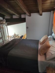 Postel nebo postele na pokoji v ubytování La casa de la abuela Amalia