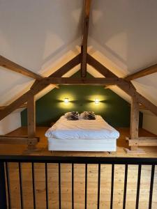 En eller flere senge i et værelse på Het Zwaluwnest