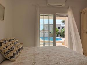 Postel nebo postele na pokoji v ubytování Villa Maria by Albir Proper Properties
