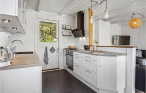 Kuchyň nebo kuchyňský kout v ubytování Holiday Home Kringsvej