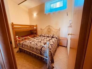 Postel nebo postele na pokoji v ubytování Dimora - L antico Fienile del Castello