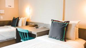 Postel nebo postele na pokoji v ubytování Work Hotel Design + 37 fotografií
