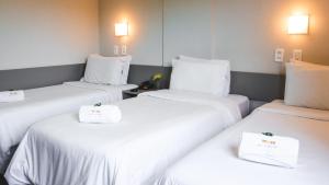 Postel nebo postele na pokoji v ubytování Work Hotel Design