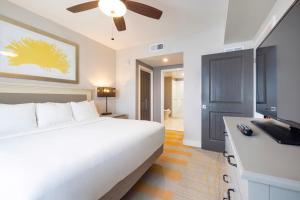 Ein Bett oder Betten in einem Zimmer der Unterkunft WorldMark Orlando Kingstown Reef