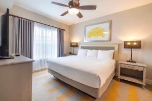 Ein Bett oder Betten in einem Zimmer der Unterkunft WorldMark Orlando Kingstown Reef