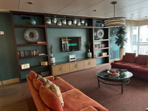 a living room with a couch and a coffee table at Domain at Kirby in Houston