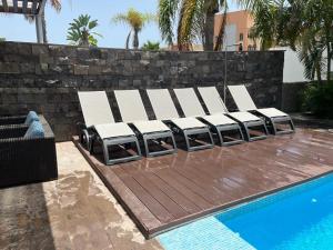 Bazén v ubytování Exclusive Villa in Bahia del Duque nebo v jeho okolí