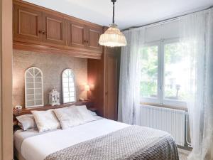 Rúm í herbergi á Típica Casa Andorrana en Encamp l by BonesVacances