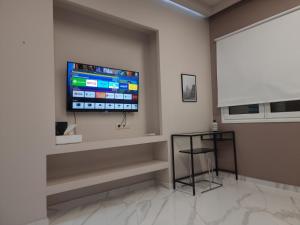 TV a/nebo společenská místnost v ubytování CENTRAL