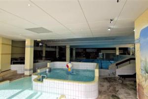 Posezení v ubytování 2-Zimmer Wohnung, Pools, Sauna und Balkon