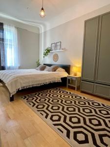 Ένα ή περισσότερα κρεβάτια σε δωμάτιο στο 3 bedroom apartment near the city center