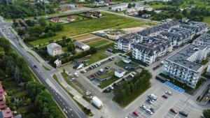 an aerial view of a city with buildings and a street at ROSE Luxury Apartments in Lublin