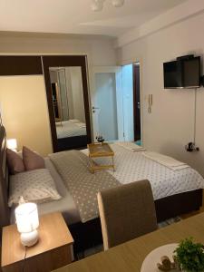 Krevet ili kreveti u jedinici u okviru objekta Apartman NS Dan CENTAR