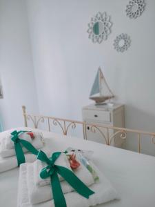 A bed or beds in a room at Casa Gioia