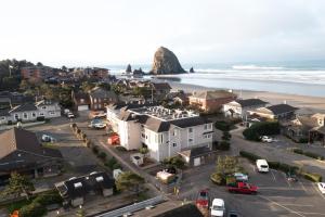 an aerial view of a town with a beach at Hallmark Resort in Cannon Beach in Cannon Beach