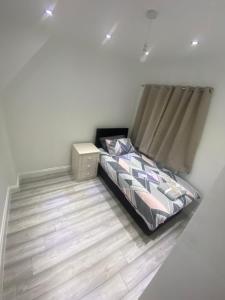 Katil atau katil-katil dalam bilik di 3 Bedroom House in Loughborough