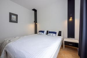 Postel nebo postele na pokoji v ubytování Apartments Vesna