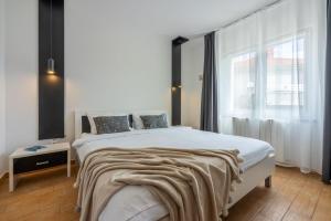 Postel nebo postele na pokoji v ubytování Apartments Vesna