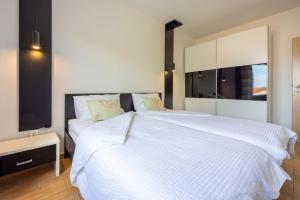 Postel nebo postele na pokoji v ubytování Apartments Vesna