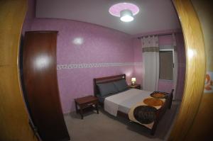 Cama ou camas em um quarto em Coopérative Village Jbel Moussa du Tourisme
