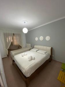 Posteľ alebo postele v izbe v ubytovaní LILA apartments 1