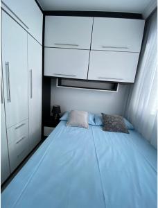 Postel nebo postele na pokoji v ubytování Apartamento próximo de dois shoppings, shopping Curitiba e shopping Estação!