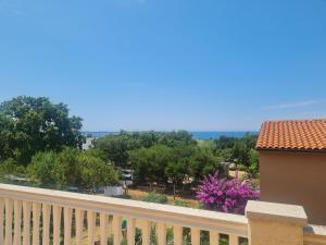 a view from the balcony of a house at Apartments KUĆA SUNCE in Vodnjan