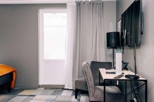 TV a/nebo společenská místnost v ubytování Best Western Plus JA Hotel Karlskrona