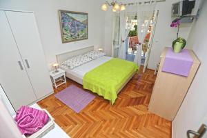 Łóżko lub łóżka w pokoju w obiekcie Apartments Prosperina Hvar