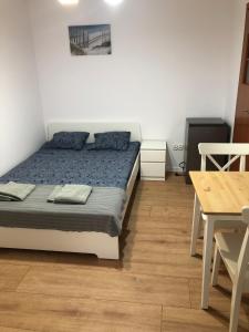 Postel nebo postele na pokoji v ubytování Kapitan Czarnobrody