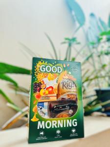 a box of good morning cereal sitting on a table at Browns Plains Motor Inn in Browns Plains