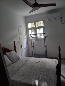 Postel nebo postele na pokoji v ubytování Logement du soleil