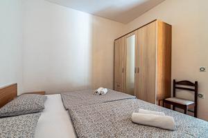 Posteľ alebo postele v izbe v ubytovaní Apartment Tri Zala 9237a