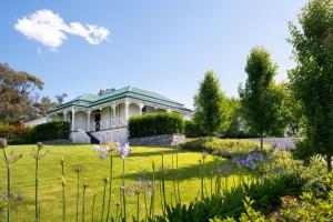 a house with a garden in front of it at Barwidgee in Hepburn Springs