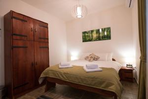 En eller flere senger på et rom på Gardoš rooms
