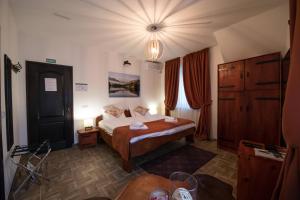 En eller flere senger på et rom på Gardoš rooms