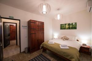 En eller flere senger på et rom på Gardoš rooms