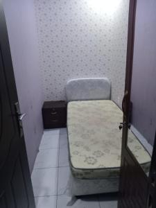 a small room with a mattress on the floor at Partition Al rigga in Dubai