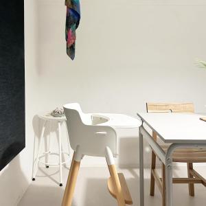 a white chair and a table in a room at busan UA Stay House 우아 스테이 in Busan