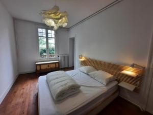 Ένα ή περισσότερα κρεβάτια σε δωμάτιο στο Maison Anglet, 7 pièces, 11 personnes - FR-1-239-860