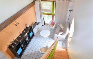 an overhead view of a small room with a staircase at Awesome Home In Sand With Kitchen in Sand