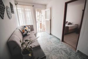 Postel nebo postele na pokoji v ubytování CASA SANTA CIRCASIA + 1 fotografie