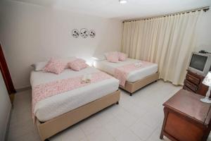 Llit o llits en una habitació de CASA SANTA CIRCASIA