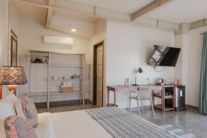 TV a/nebo společenská místnost v ubytování Kaimana Resort Siargao