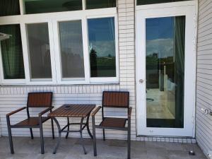 Balkón nebo terasa v ubytování Wind Sea Hill Inn