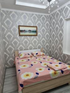 Кровать или кровати в номере Deluxe