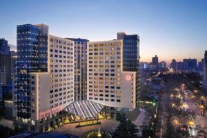 a view of a building in a city at night at Sheraton Xi'an Hotel in Xi'an