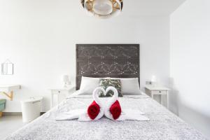 Posteľ alebo postele v izbe v ubytovaní Apartamentos Las Terrazas de Sotavento