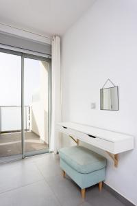Posedenie v ubytovaní Apartamentos Las Terrazas de Sotavento