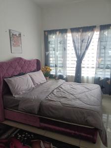 Кровать или кровати в номере Cikta'z Homestay Southville City Bangi +4 фотографии